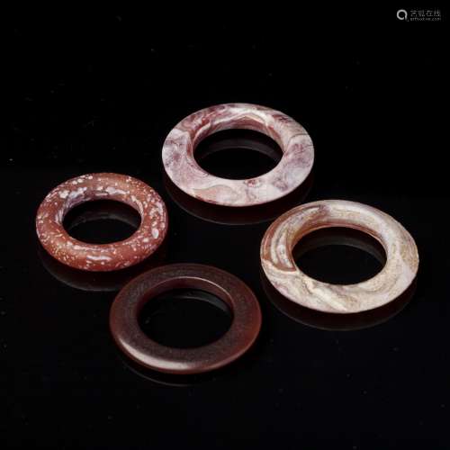 FOUR PIECES OF JADE RINGS, CHINA