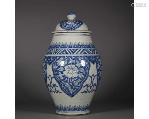 A BLUE AND WHITE VASE AND COVER