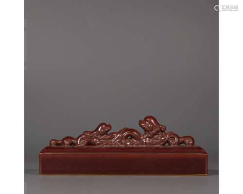 A BROWN-GLAZE CARVED PAPER WEIGHT