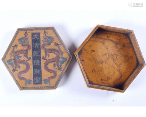 A LACQUER HEXAGONAL BOX AND COVER
