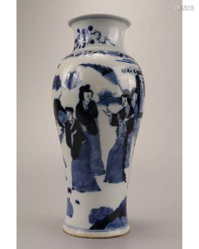 A BLUE AND WHITE FIGURAL VASE