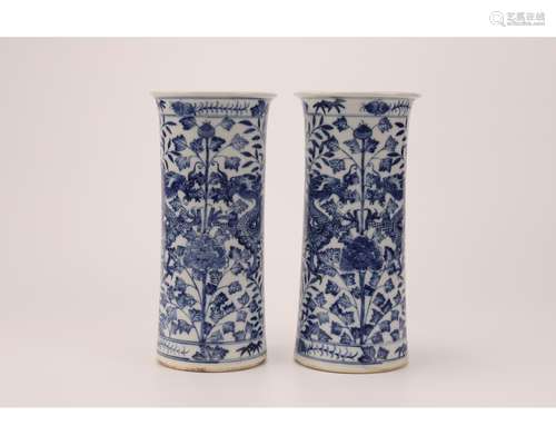 A PAIR OF BLUE AND WHITE HAT HOLDERS