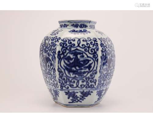 A BLUE AND WHITE HEXAGONAL JAR