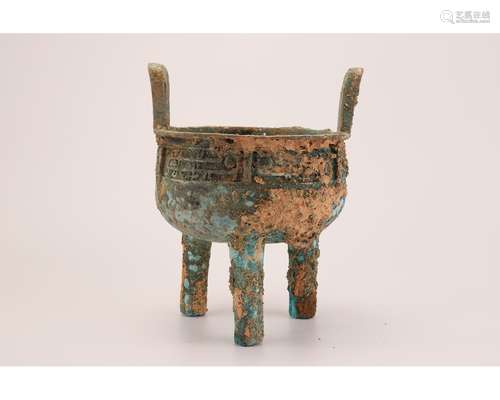 A BRONZE TRIPOD CENSER