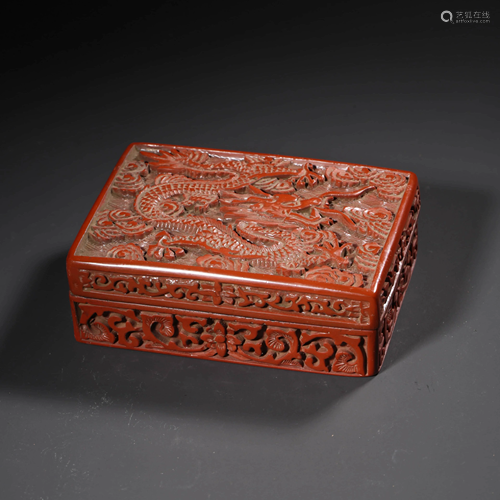 A FLORAL & DRAGON PATTERN CARVED RED LACQUERWORK BOX