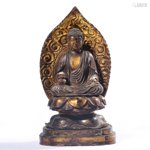 A GILT CARVED BAMBOO SAKYAMUNI STATUE