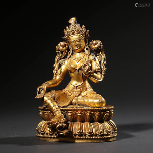 A GILT-BRONZE STATUE OF TARA