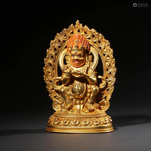 A STAND GILT-BRONZE STATUE OF MAHAKALA