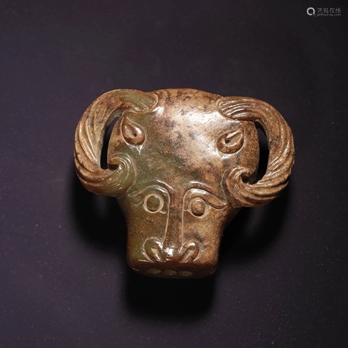 A OX-HEAD CARVED JADE BI