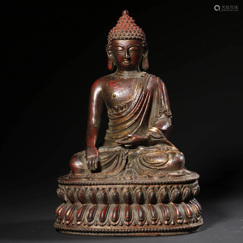 A GILD BRONZE SEATED STATUE OF SAKYAMUNI