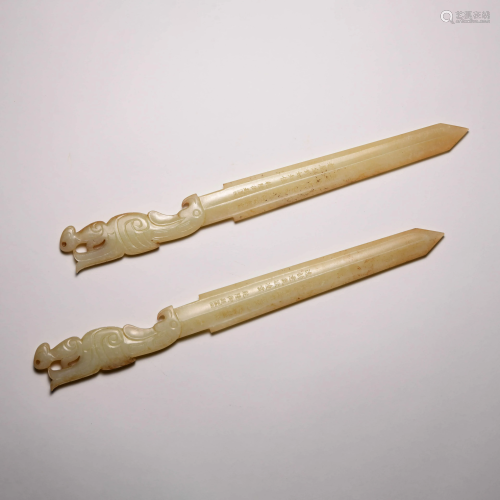 A PAIR OF CHINESE JADE IMPERIAL POEMS SWORDS