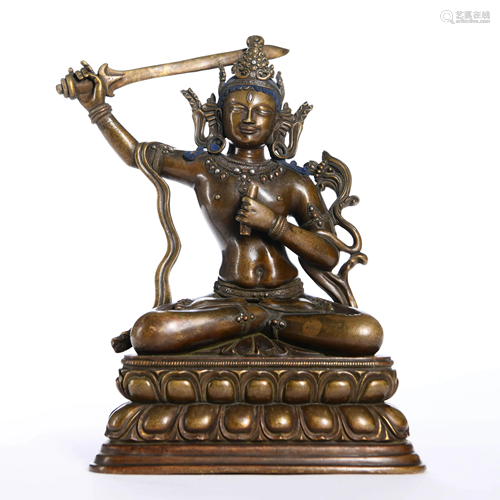 A 12TH CENTURY CHINESE GILT-BRONZE MANJUSHRI STATUE IN