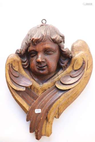 棕色斑纹木雕，小天使的脸。36,5 x 29.