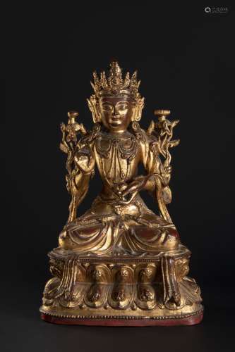 A CHINESE GILT-BRONZE FIGURE OF KSITIGARBHA
