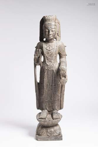 A CHINESE STONE STANDING BODHISATTVA