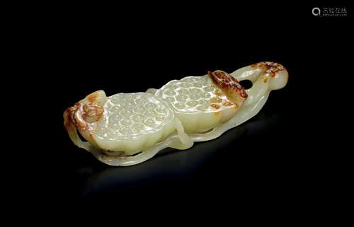 A CHINESE CELADON AND RUSSET JADE 'DOUBLE LOTUS' CARVING