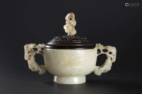 A CHINESE CARVED JADE CUP WITH WOODEN LID