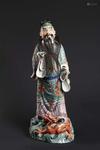 A CHINESE CERAMIC DIGNITARY IN DRAGON ROBE