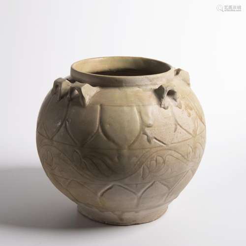 A CARVED CELADON GLAZED HANDLED JAR