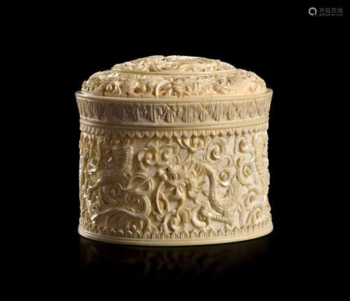 A CARVED IVORY BOX AND COVER