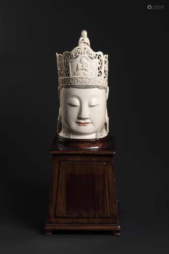 A CARVED IVORY HEAD OF GUANYIN