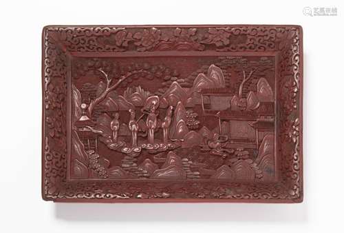 A CARVED CINNABAR LACQUER TRAY