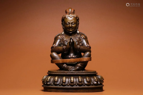 A SILVER INLAID COPPER ALLOY FIGURE OF MAHASIDDHA