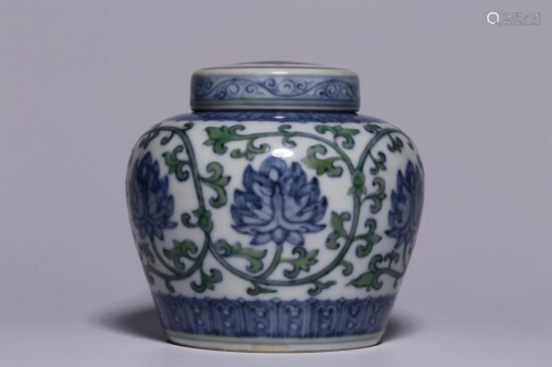 A BLUE AND WHITE DOUCAI 'FLOWER' JAR WITH COVER