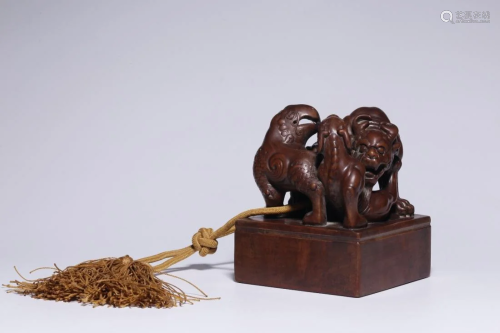 A SANDALWOOD CARVED 'BEAST' SQUARE SEAL