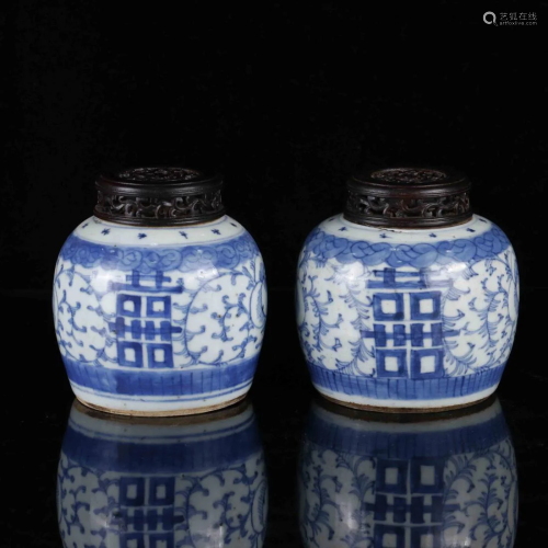 A PAIR OF BLUE AND WHITE 'XI' CHARACTER JARS