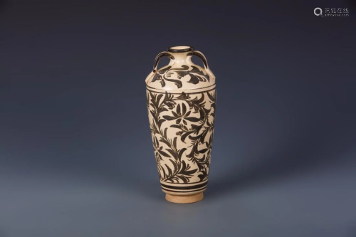 A CIZHOU WARE FLORAL PAINTED HANDLED VASE