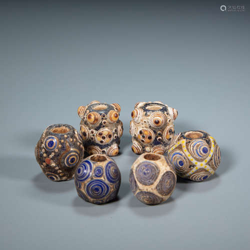 A GROUP OF CHINESE DRAGONFLY EYE GLASS BEADS, HAN DYNASTY