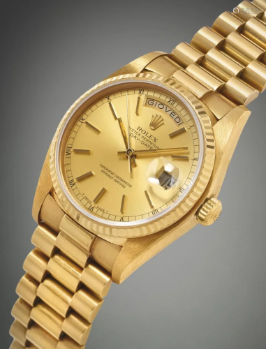 GOLD ROLEX DAY-DATE REF. 18038 WITH BOX AND PAPER,