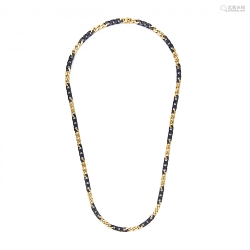 long yellow gold and steel chain