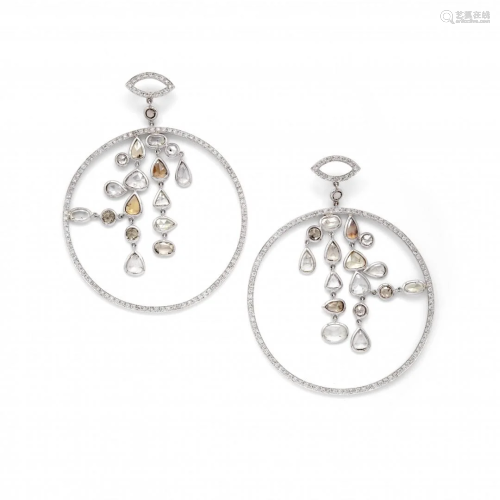 pair of pendent diamond earrings