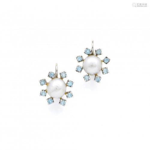 pair of pearl and blue topaz earrings