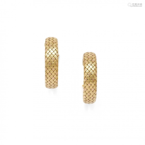 pair of two tone gold hoop earrings