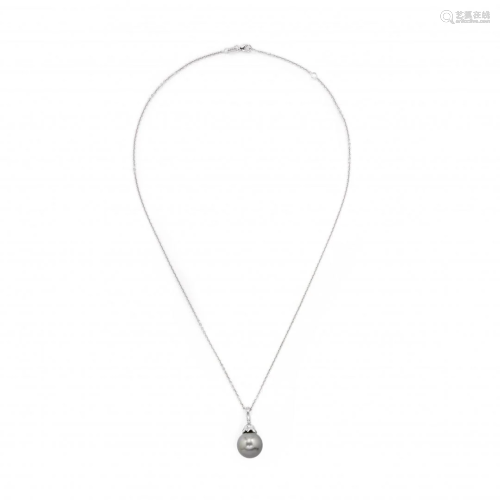 necklace with diamond and pearl pendant
