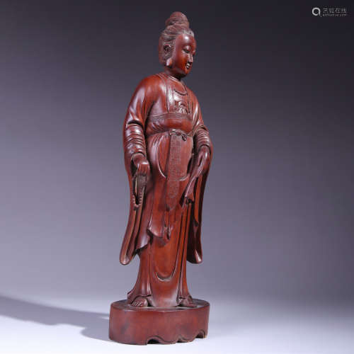 A carved boxwood statue of guanyin