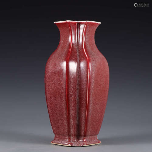 A red-glazed conjoined double-vase