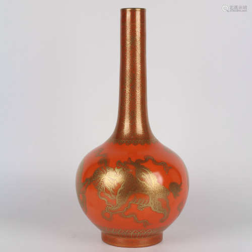 A gilt-inlaid iron-red-glazed lions bottle vase