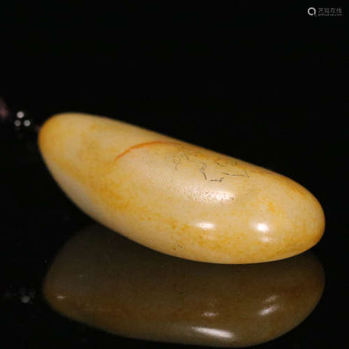 A hetian jade inscribed boulder pendant