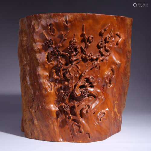A carved boxwood plum blossoms brushpot
