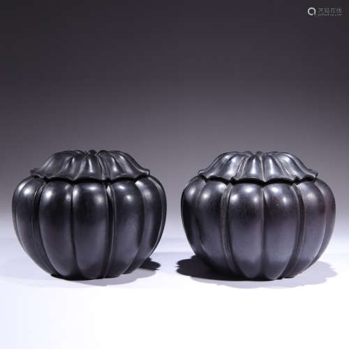 A pair of carved sandalwood weiqi jars and covers