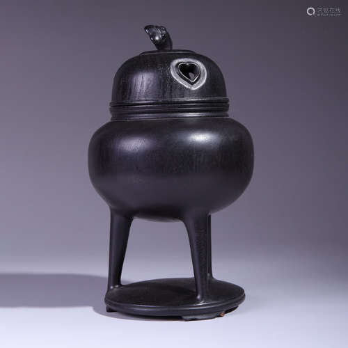 A sandalwood lingzhi incense burner