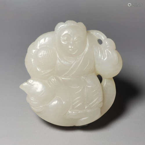 A carved white jade figure pendant