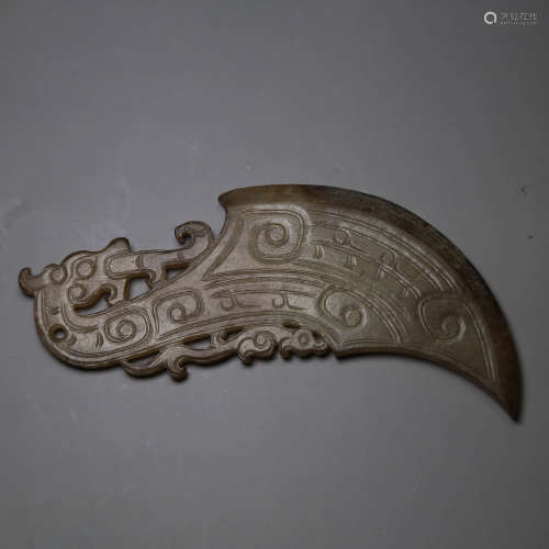 A carved jade axe