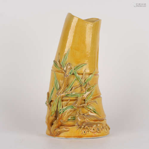 a yellow-glazed bamboo-shaped porcelain wall vase