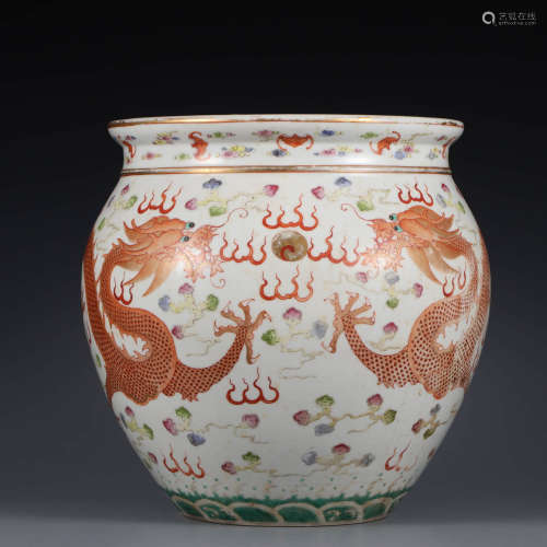 A Famille rose dragons porcelain jar
