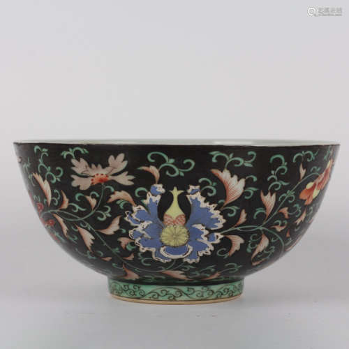 A black-ground Famille rose interlocking lotus bowl